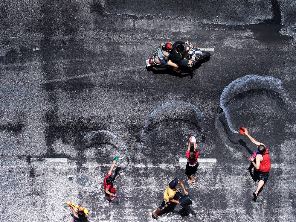 Picture of people splashing water on each other in Thailand
