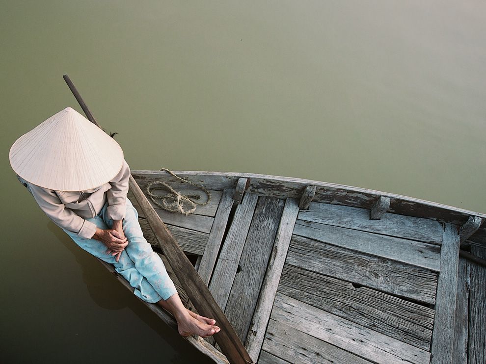 Picture of a river tour guide in Vietnam waiting for passengers