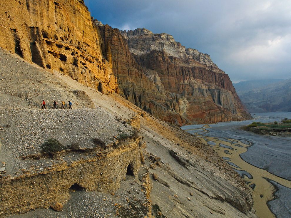 Pictures of climbers along a trail in Nepal